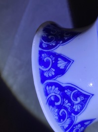 A pair of Chinese blue and white rouleau vases, Kangxi